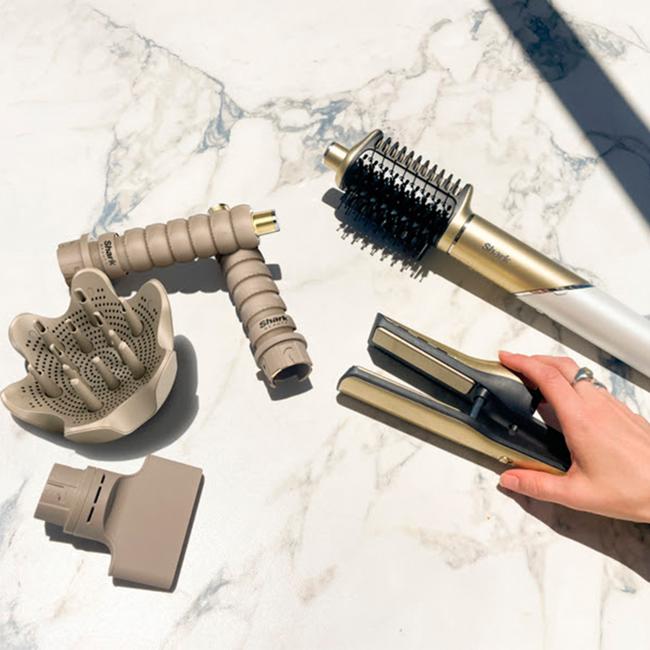 Plancha de aire caliente con herramientas moldeadoras Shark Glam.